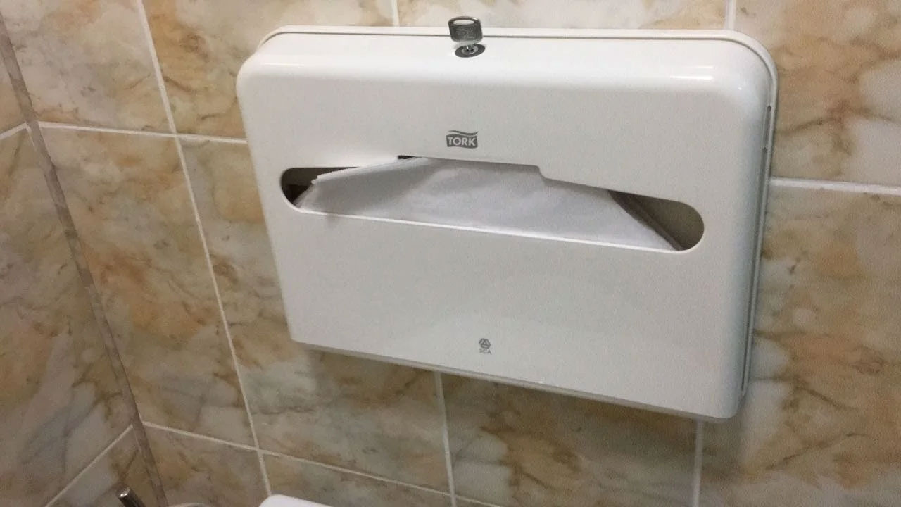 Тримач для покриття сидіння унітазу Максі  Elevation, пластиковий,(V1), біл. Tork - фото 3