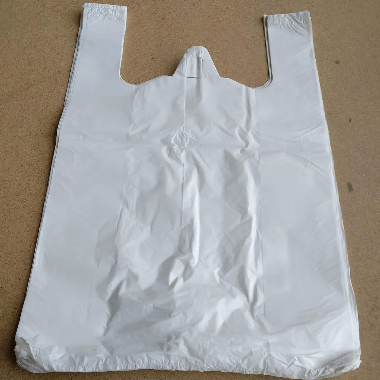 Пакет-майка 40+18*60см./54мкм., міцні, 50шт/уп., біл. Україна - фото 1